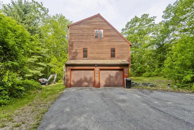 245 State Rd, Phillipston, MA 01331 - view of property exterior with a garage and asphalt driveway
