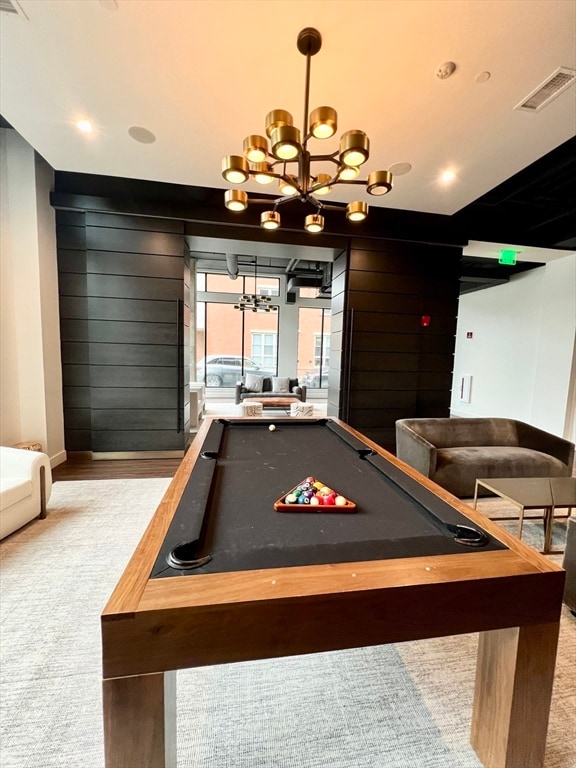 rec room with light colored carpet and pool table