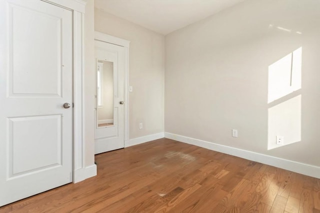 127-129 Franklin St, Malden, MA 02148 - unfurnished bedroom featuring light wood finished floors and baseboards