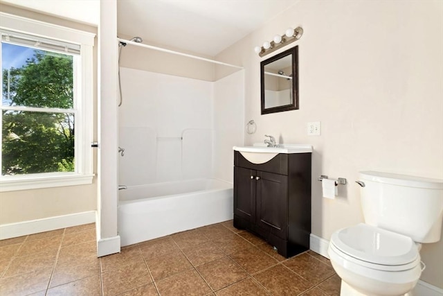 127-129 Franklin St, Malden, MA 02148 - bathroom featuring vanity, toilet,  shower combination, tile patterned flooring, and baseboards