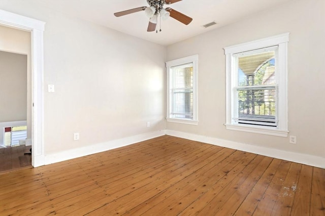 127-129 Franklin St, Malden, MA 02148 - unfurnished room featuring hardwood / wood-style floors, baseboards, and a ceiling fan