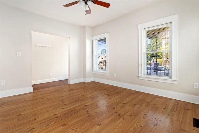 127-129 Franklin St, Malden, MA 02148 - unfurnished room featuring a ceiling fan, wood finished floors, and baseboards