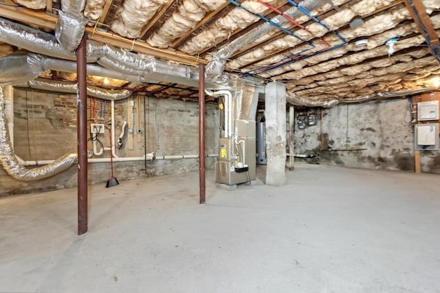 127-129 Franklin St, Malden, MA 02148 - unfinished basement with heating unit and gas meter