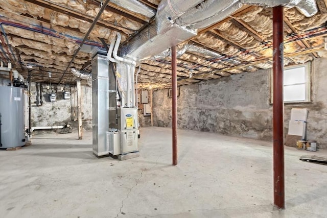 127-129 Franklin St, Malden, MA 02148 - unfinished basement with water heater and heating unit