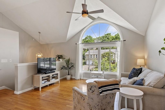 5 Holly Ter, Worcester, MA 01607 - living area with vaulted ceiling, a chandelier, light wood-type flooring, and ceiling fan