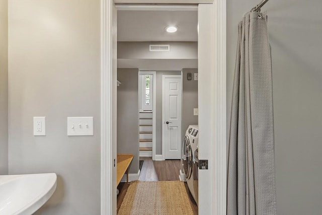 5 Holly Ter, Worcester, MA 01607 - bathroom with washer and dryer, wood finished floors, and recessed lighting