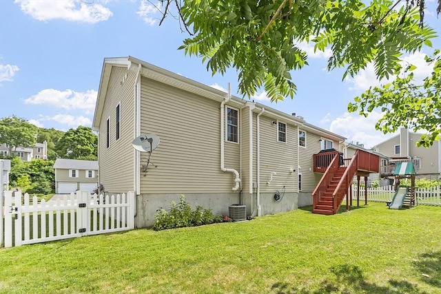 5 Holly Ter, Worcester, MA 01607 - back of house with stairs, a deck, and a playground