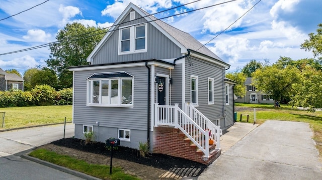 view of front of home with a front yard