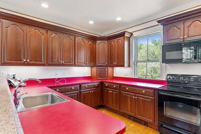 267 Pearl Hill Rd, Fitchburg, MA 01420 - kitchen featuring black appliances, a sink, ornamental molding, light wood-type flooring, and recessed lighting