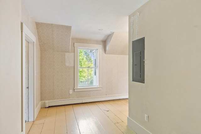 267 Pearl Hill Rd, Fitchburg, MA 01420 - additional living space featuring baseboard heating, electric panel, baseboards, and wood-type flooring
