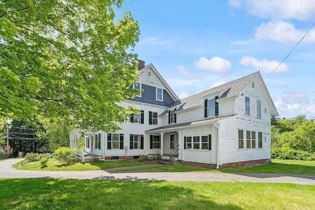 267 Pearl Hill Rd, Fitchburg, MA 01420 - view of front of property featuring a front yard and a shingled roof