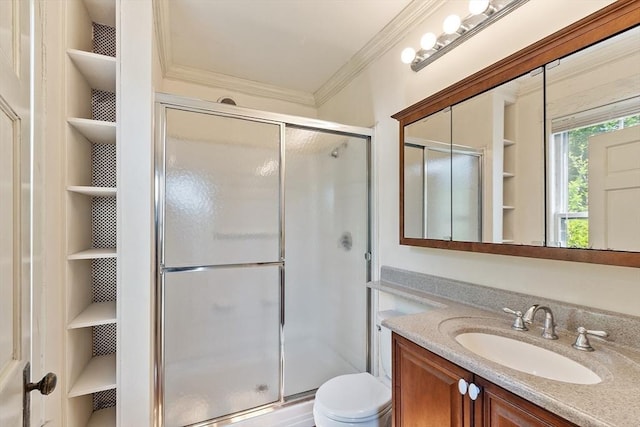 267 Pearl Hill Rd, Fitchburg, MA 01420 - bathroom with a stall shower, ornamental molding, built in shelves, vanity, and toilet