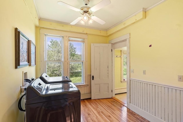 267 Pearl Hill Rd, Fitchburg, MA 01420 - clothes washing area featuring washer and dryer, light wood finished floors, a ceiling fan, crown molding, and a wainscoted wall