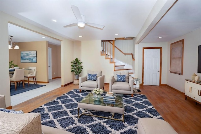 30 Royal St, Randolph, MA 02368 - living area featuring wood finished floors, stairway, baseboards, ceiling fan, and recessed lighting