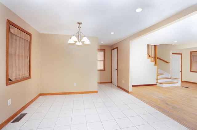 30 Royal St, Randolph, MA 02368 - unfurnished room featuring a chandelier, recessed lighting, stairway, baseboards, and light wood-type flooring