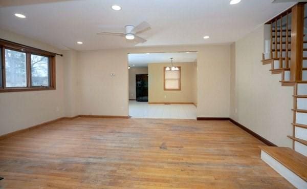 30 Royal St, Randolph, MA 02368 - spare room featuring wood finished floors, baseboards, stairs, recessed lighting, and a ceiling fan