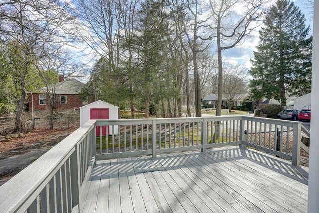 30 Royal St, Randolph, MA 02368 - wooden deck with an outdoor structure, a shed, and fence