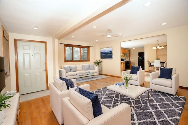 30 Royal St, Randolph, MA 02368 - living area with light wood finished floors, recessed lighting, ceiling fan, baseboards, and a chandelier