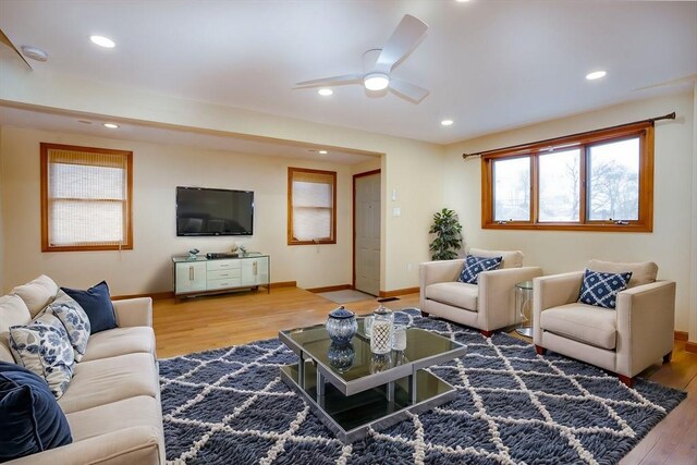 30 Royal St, Randolph, MA 02368 - living area with wood finished floors, ceiling fan, baseboards, and recessed lighting