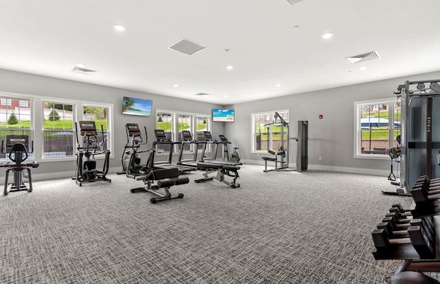 exercise room with recessed lighting, carpet flooring, visible vents, and baseboards