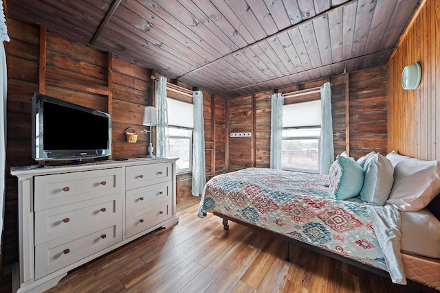 18 Marshfield Ave, Scituate, MA 02066 - bedroom featuring log walls, wood ceiling, multiple windows, and hardwood / wood-style flooring