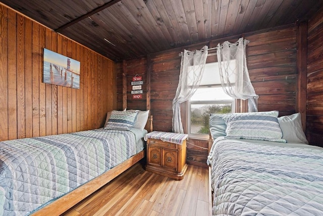 18 Marshfield Ave, Scituate, MA 02066 - bedroom with wood walls, hardwood / wood-style flooring, and wood ceiling
