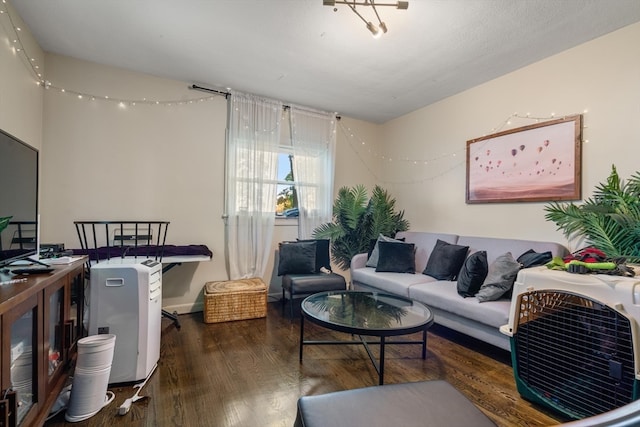 living room with dark hardwood / wood-style floors