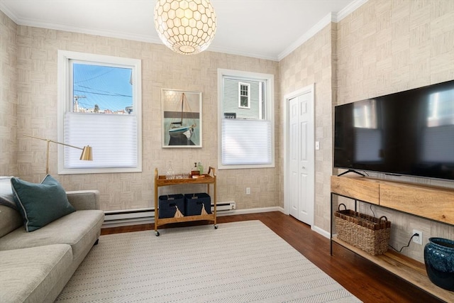 living room with a baseboard radiator, wood finished floors, baseboards, ornamental molding, and wallpapered walls