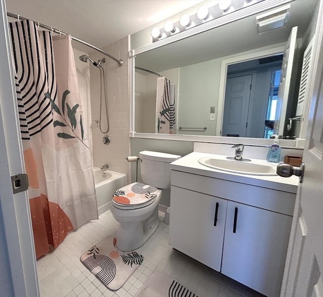 bathroom featuring shower / tub combo with curtain, vanity, toilet, and tile patterned floors