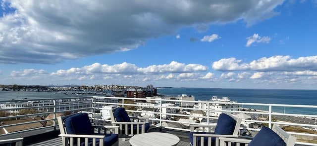 balcony featuring a water view