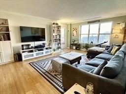 living area with wood finished floors