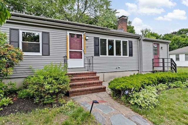 15 Leonard Rd, Sharon, MA 02067 - view of front facade with a chimney