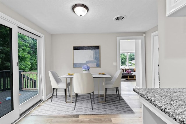 15 Leonard Rd, Sharon, MA 02067 - dining space featuring plenty of natural light and light wood-style flooring
