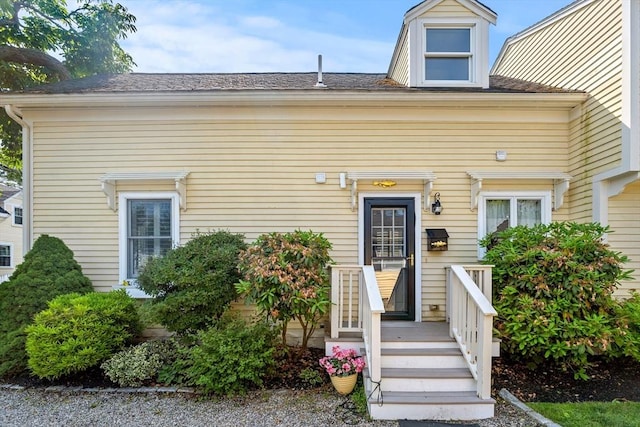 35 Commercial St Unit A, Marblehead, MA 01945 - view of front of property featuring roof with shingles
