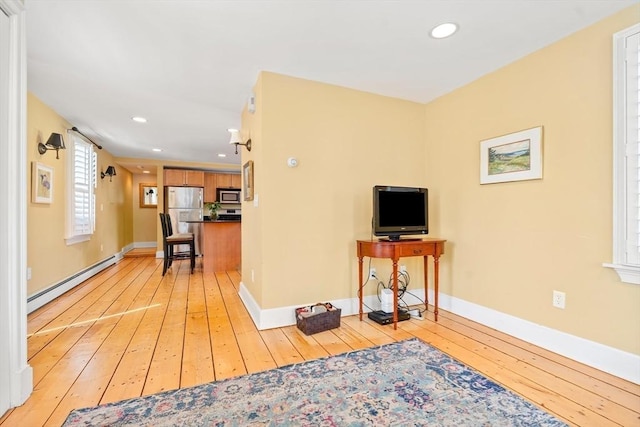 35 Commercial St Unit A, Marblehead, MA 01945 - living area with baseboard heating, light wood-style flooring, and recessed lighting