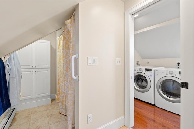 35 Commercial St Unit A, Marblehead, MA 01945 - laundry room featuring baseboard heating and washing machine and dryer