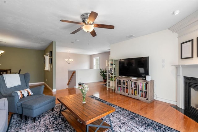 622 Hampton Way Unit 622, Abington, MA 02351 - living area with a chandelier, a high end fireplace, wood finished floors, and baseboards