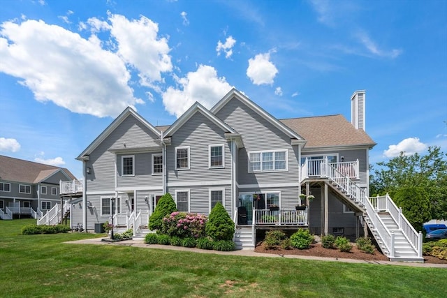 622 Hampton Way Unit 622, Abington, MA 02351 - townhome / multi-family property featuring stairs, a chimney, and a front lawn