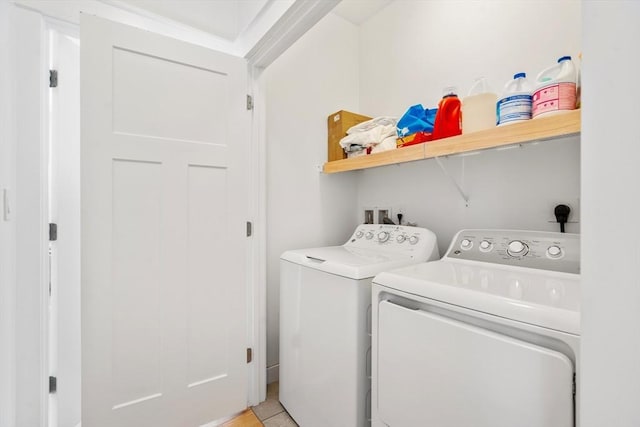washroom featuring laundry area and independent washer and dryer