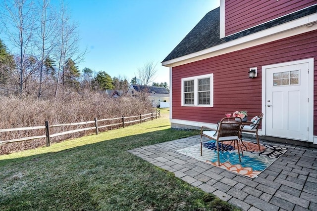 view of yard featuring a patio area and fence