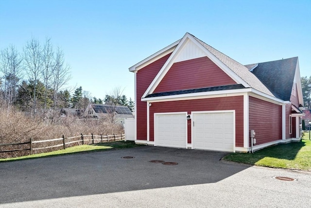 garage with fence