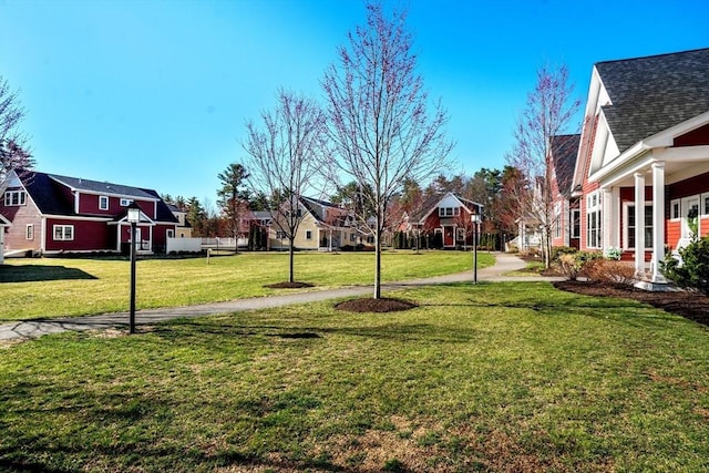 view of yard featuring a residential view
