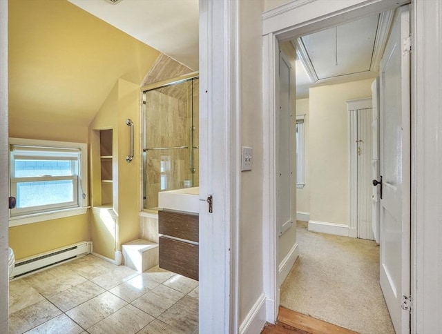 bathroom with a baseboard heating unit