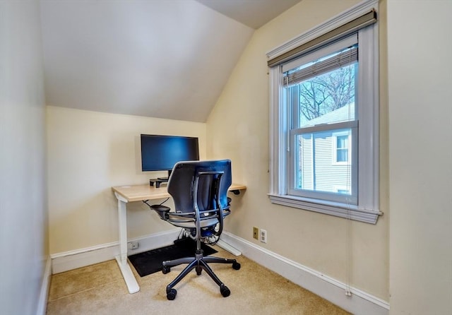 office space featuring lofted ceiling and carpet floors