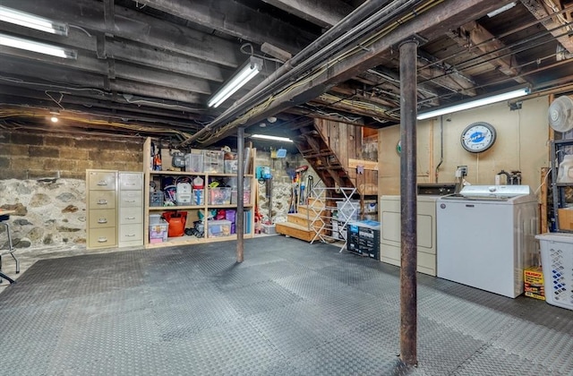 basement featuring washing machine and dryer