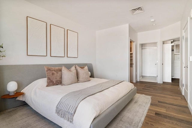 bedroom featuring wood finished floors