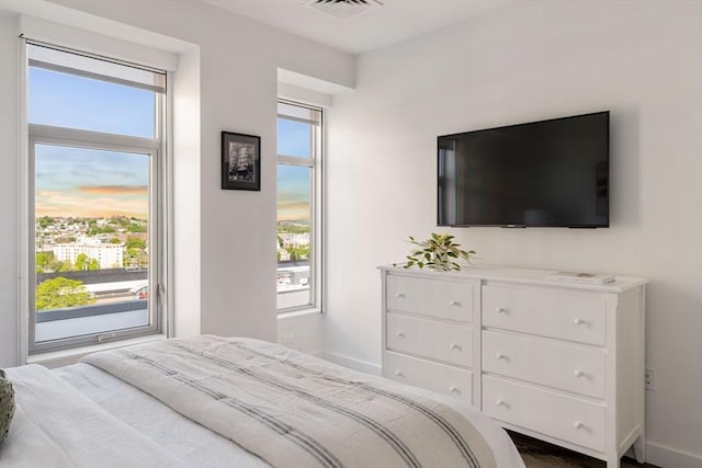 bedroom featuring baseboards