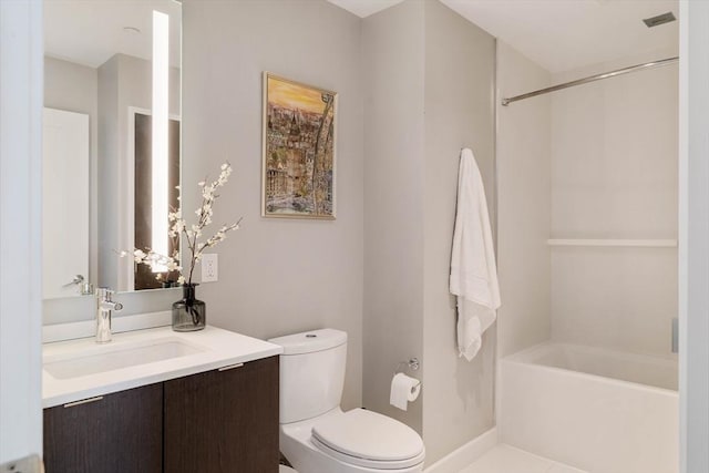 full bath featuring toilet, vanity, and bathing tub / shower combination