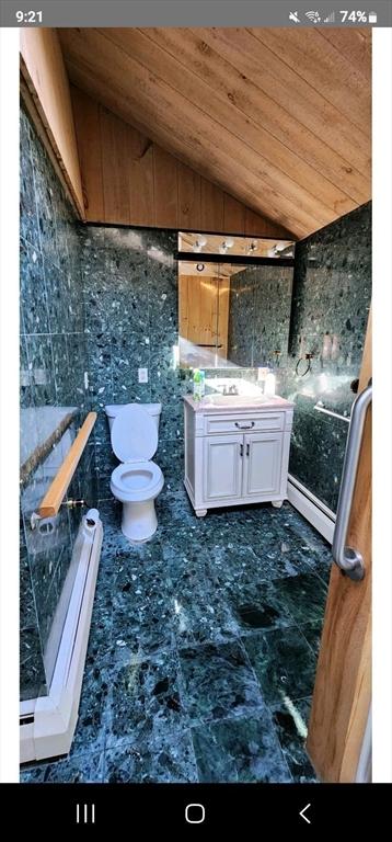 bathroom featuring vanity, vaulted ceiling, toilet, tile walls, and wood ceiling