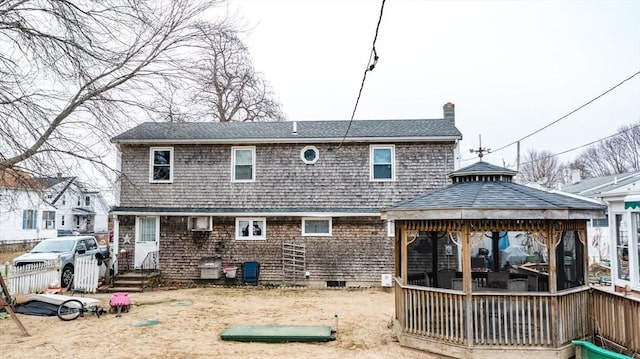 rear view of house with a gazebo